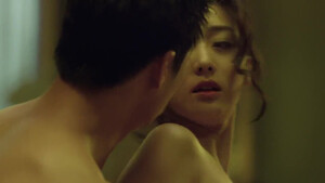 Тискает кореянку за грудь и трахает в письку