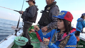 Молодая японка сосет член и трахается с напарником в коморке на катере